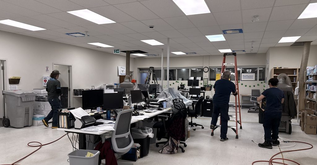 Greater Sudbury Duct Cleaning crew cleaning air ducts in a Sudbury office