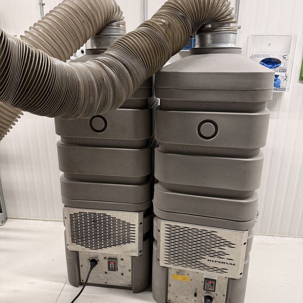 Greater Sudbury Duct Cleaning negative air machines set up on a duct cleaning job