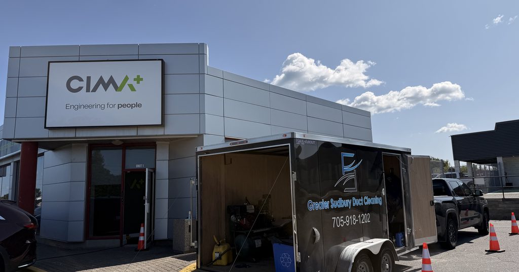 Greater Sudbury Duct Cleaning trailer on site at a commercial office building in Sudbury